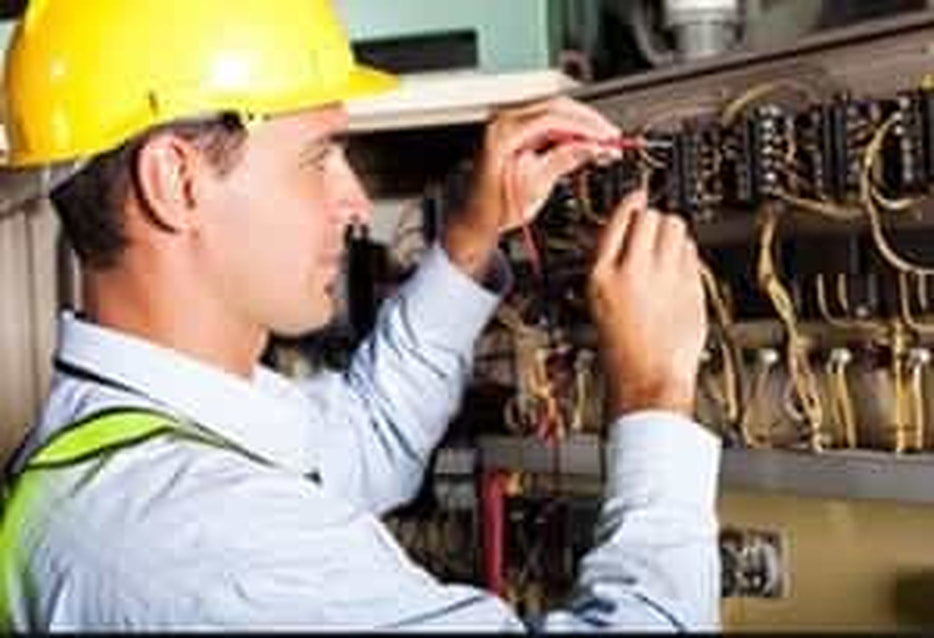 picture of an electrical technician working on electrical wiring repairs